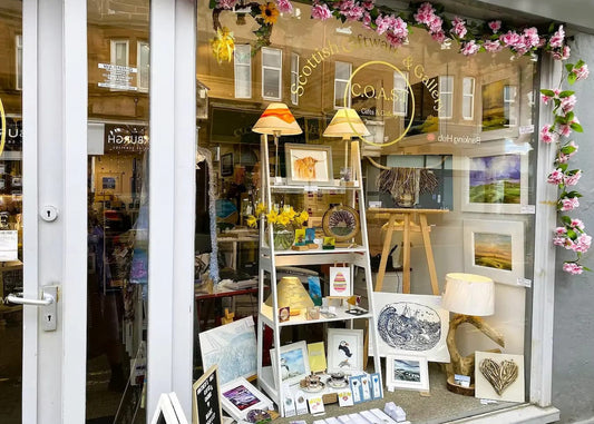 COAST Gallery in Troon shopfront displaying Scottish art and handmade gifts.