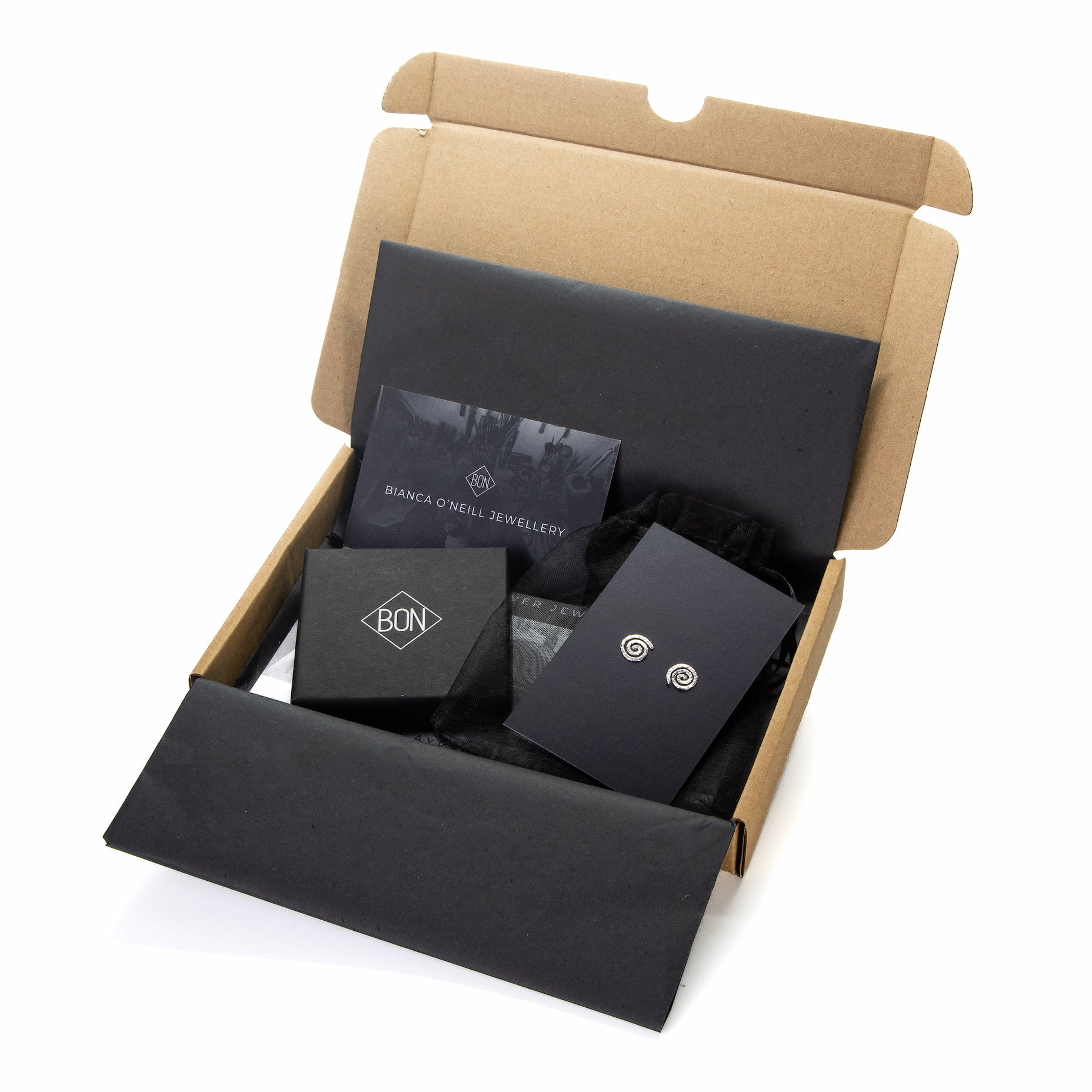 Bianca O’Neill Jewellery gift packaging with black tissue, branded  jewellery box, and example stud earrings displayed on a backing card."