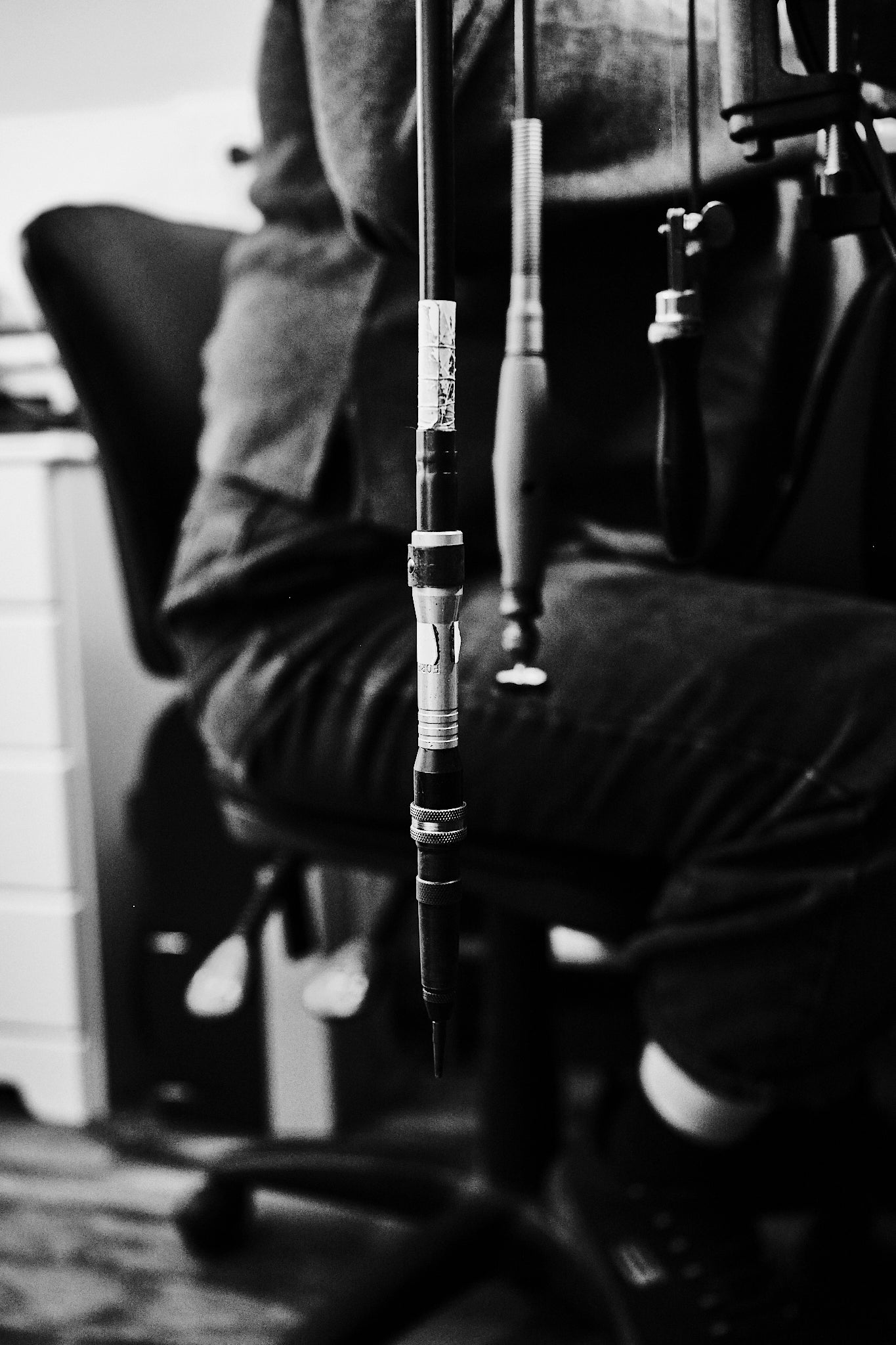 Silversmithing flex-shaft tools hanging beside Bianca’s workbench in her jewellery studio.