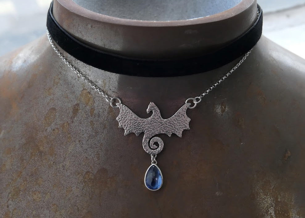 Custom velvet and silver dragon choker with kyanite on metal display