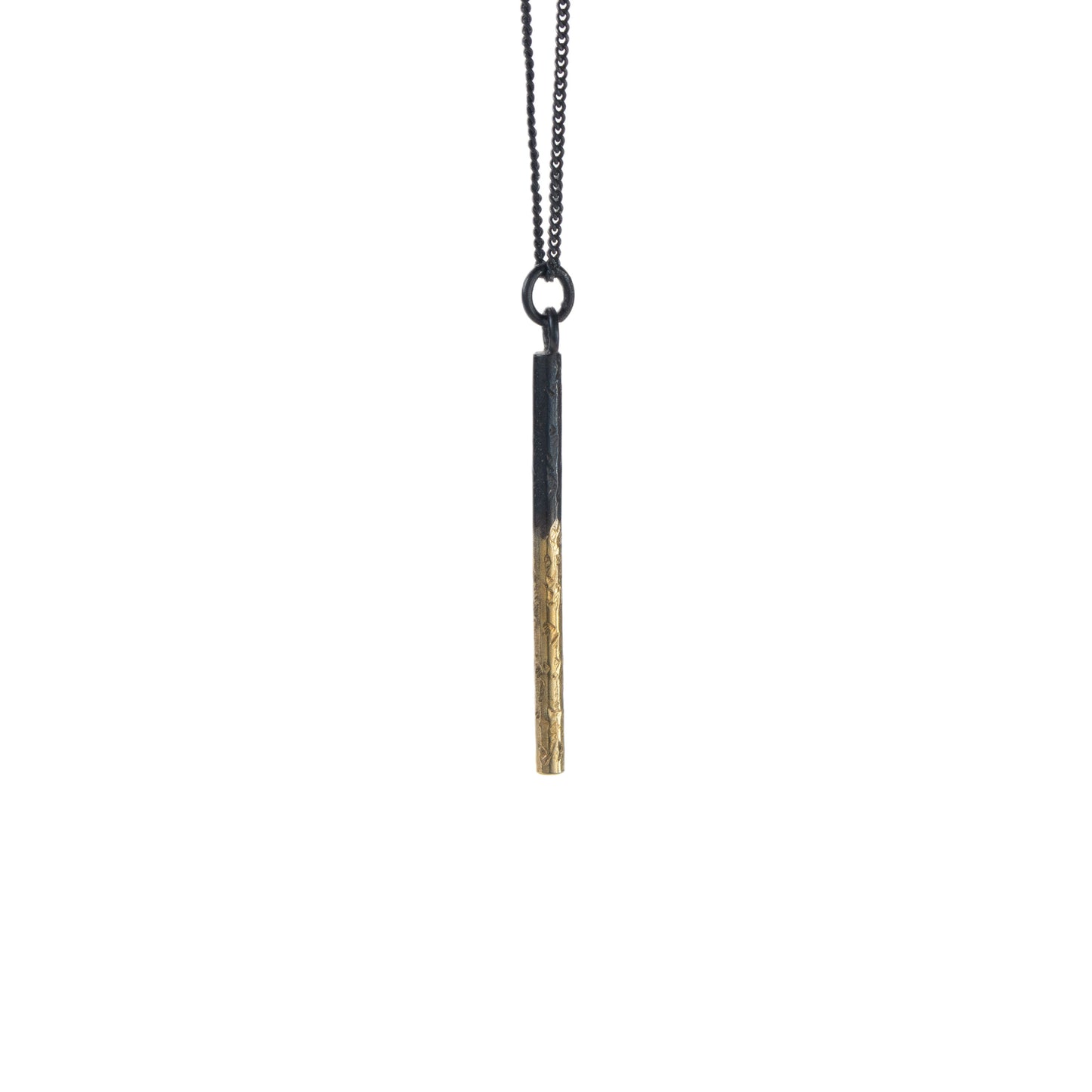 Oxidised silver pillar pendant necklace with rough hammered texture and gold detail