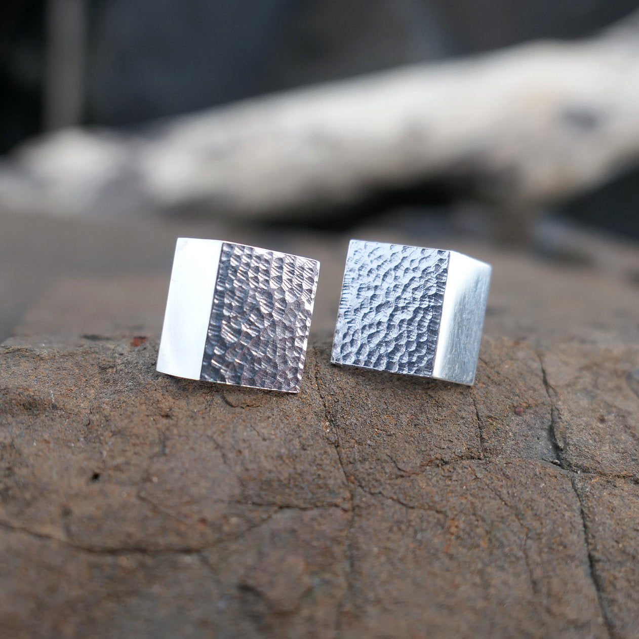 Rectangular silver stud earrings with folded form and hand carved texture, sterling silver