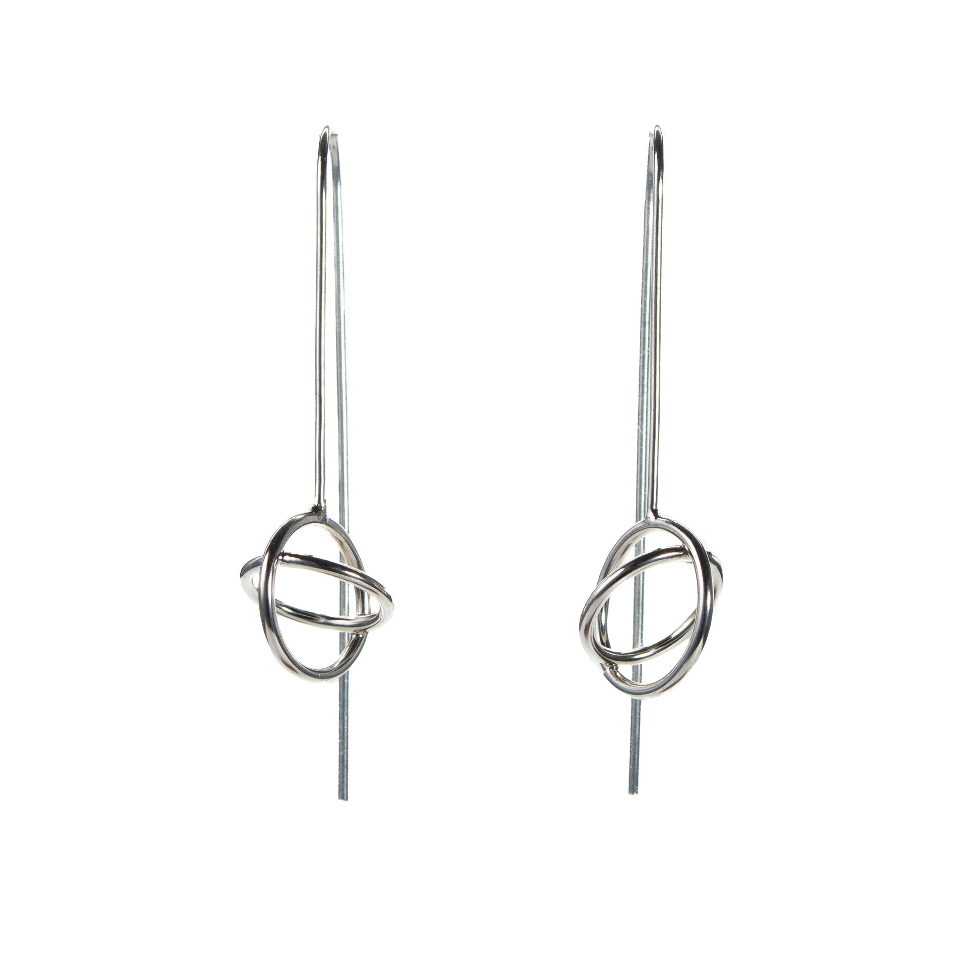 Long hook silver aperture earrings with sculptural open form